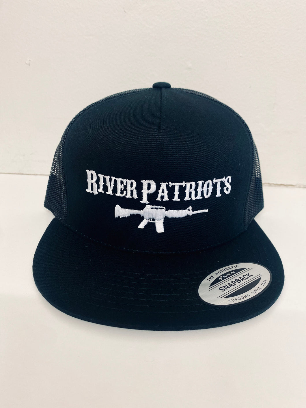 Guns Out Trucker Hat